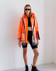Transparent coat with orange